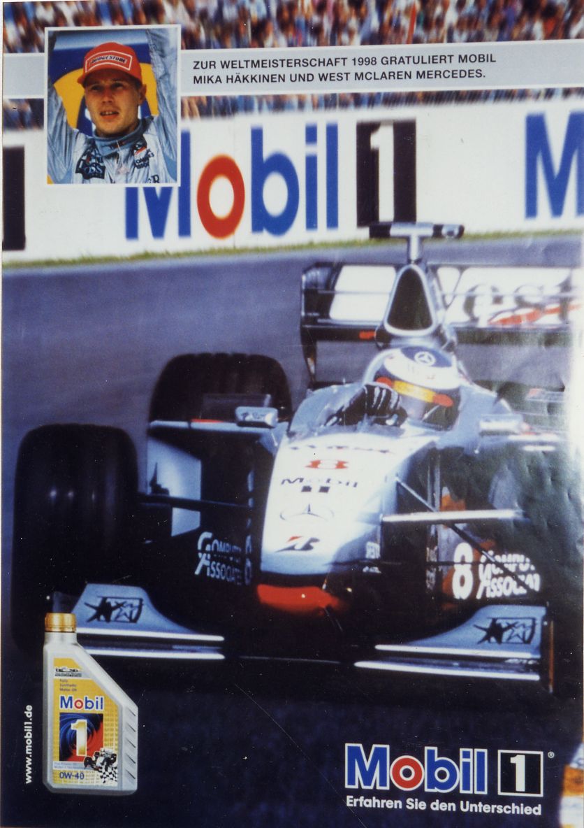 Zur Weltmeisterschaft 1998 gratuliert Mobil Mikka Häkkinen und West McLaren Mercedes.